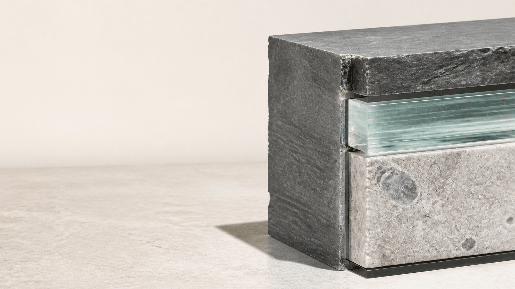 Cut stone strata and controlled structural glass