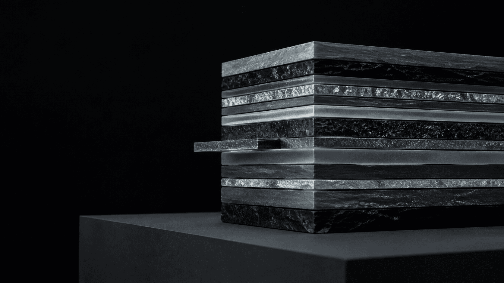 Layered obsidian and refracted mineral strata